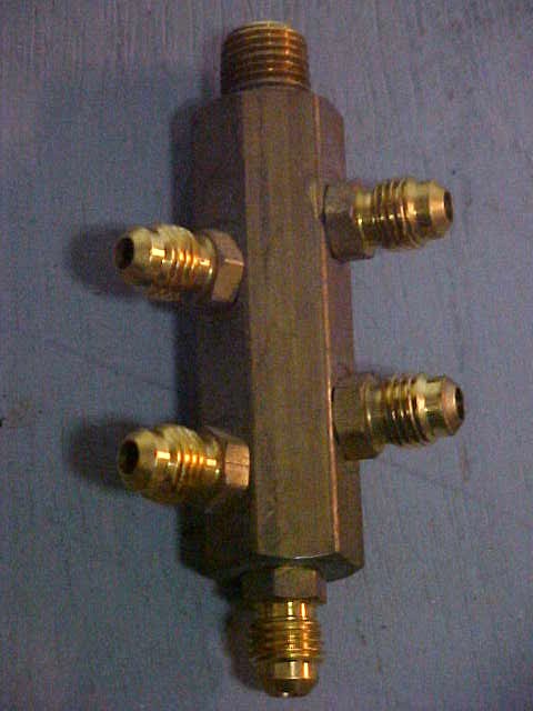 http://sodadispenserdepot.com/pics/manifold5.jpg